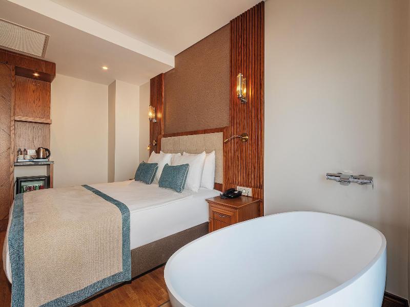 Triton Hotel - Oda