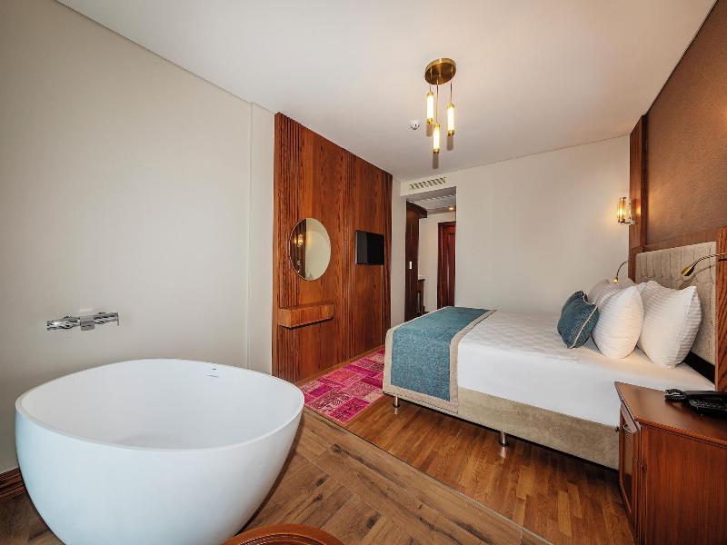 Triton Hotel - Oda