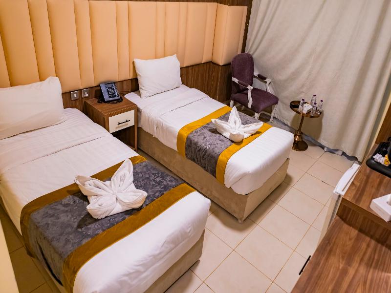 Diyafa Al Mukhtara Hotel - Oda