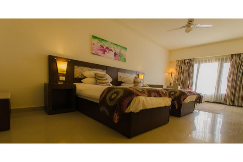 Lotus Bay Beach Resort - Oda