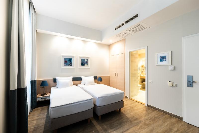 Atrium Hotel by Mellow Mood Hotels - Oda