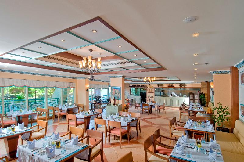 Al Raha Beach Hotel - Restoran