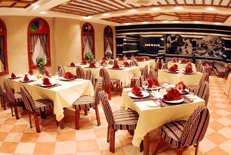 Al Liwan Suites - Restoran