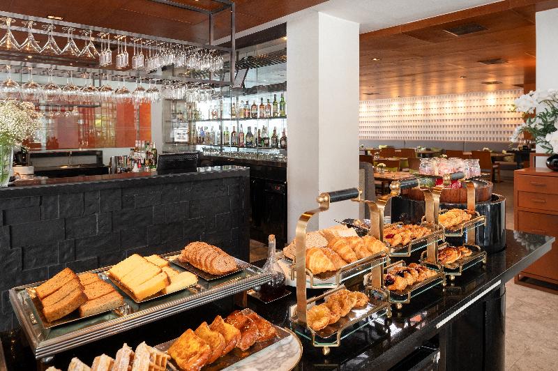 Woodlands Suites Serviced Residences - Restoran