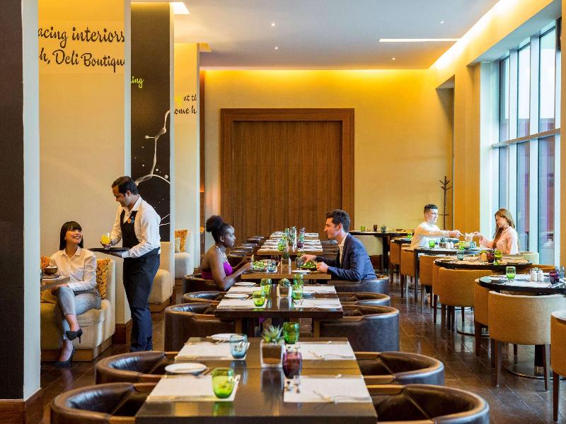 Novotel Suites Mall Avenue Dubai Hotel - Restoran