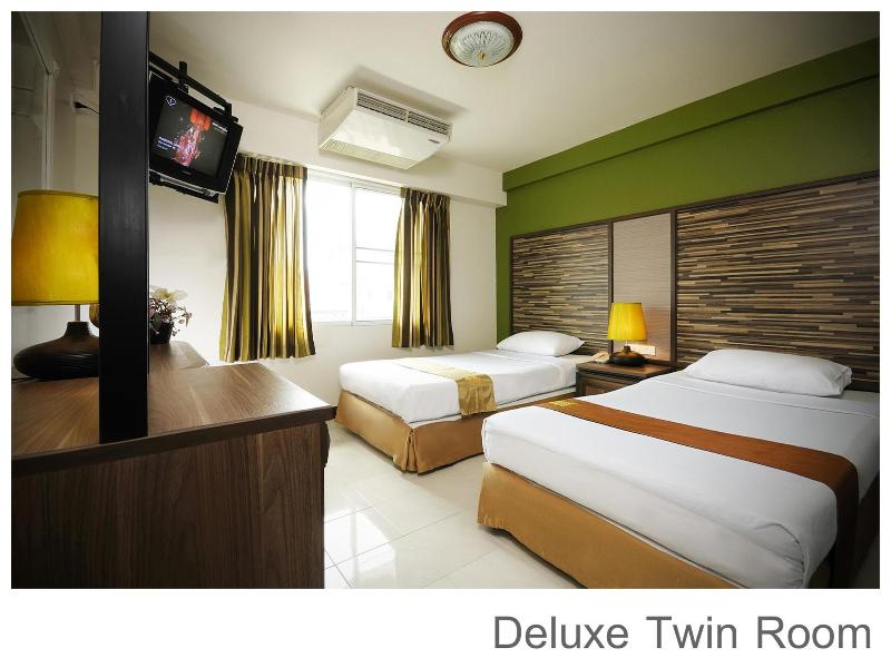 Rambuttri Village Inn & Plaza - Oda