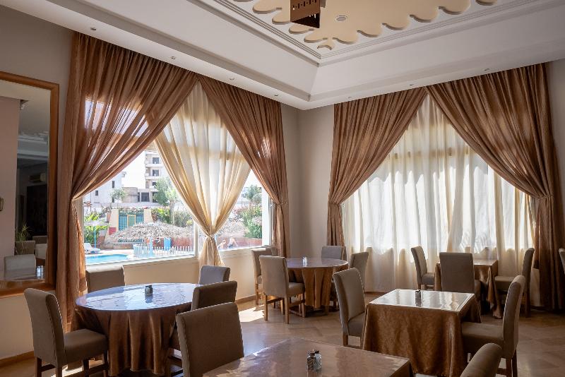 Intouriste Hôtel & Suites - Restoran