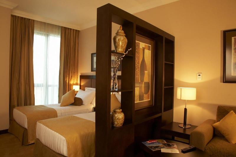 Al Manzel Hotel Apartments - Oda