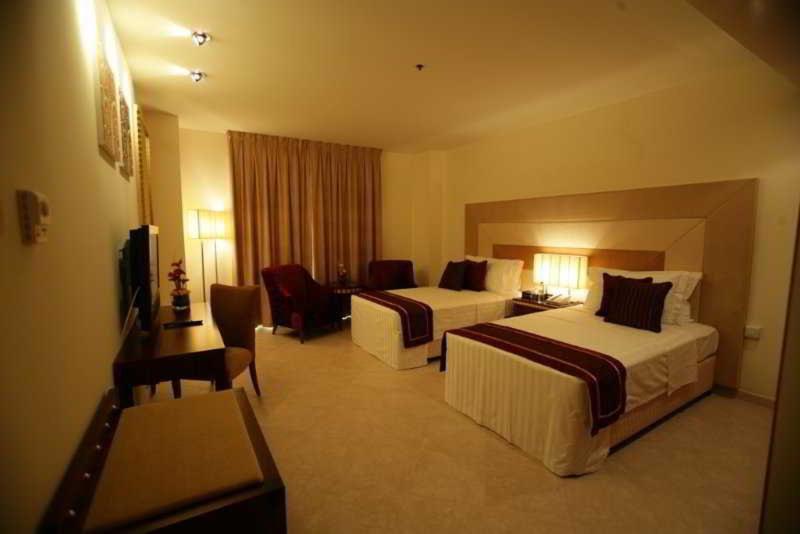 Al Manar Grand Hotel Apartment - Oda