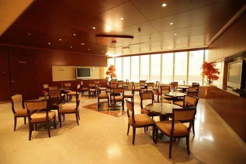 Al Manar Grand Hotel Apartment - Restoran