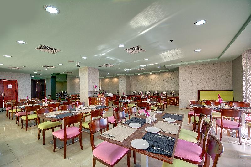 Al Manar Grand Hotel Apartment - Restoran