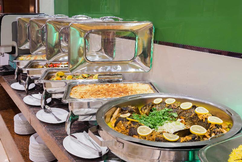 Holiday Inn Al Qasr - Restoran