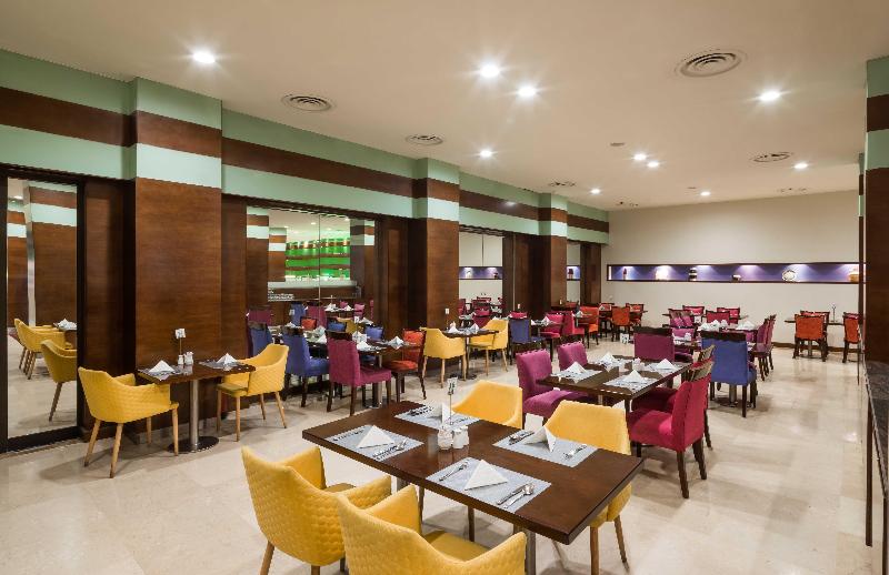 Holiday Inn Al Qasr - Restoran