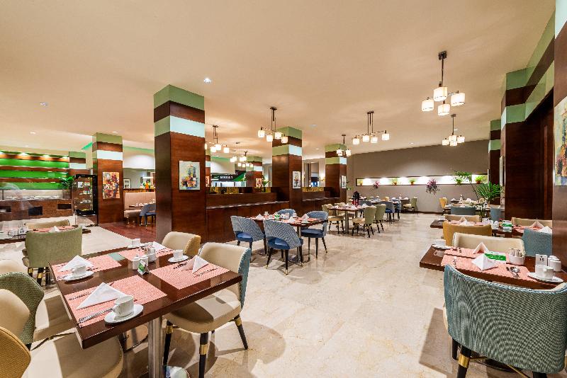Holiday Inn Al Qasr - Restoran