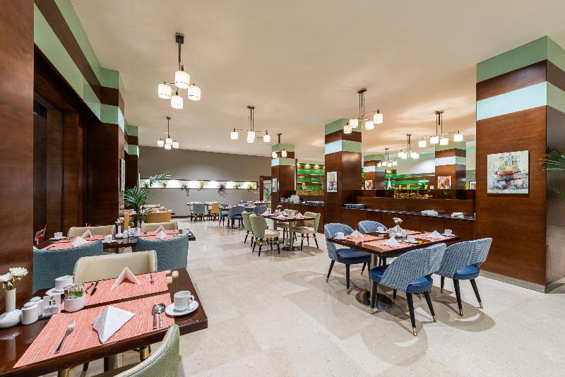 Holiday Inn Al Qasr - Restoran