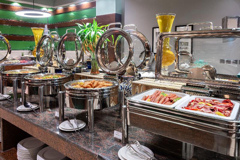 Holiday Inn Al Qasr - Restoran