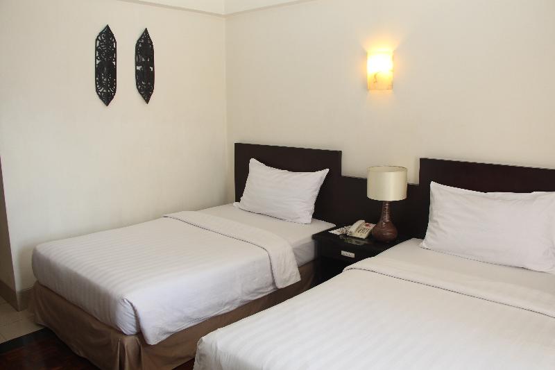 Swiss-Belhotel Borneo Samarinda - Oda