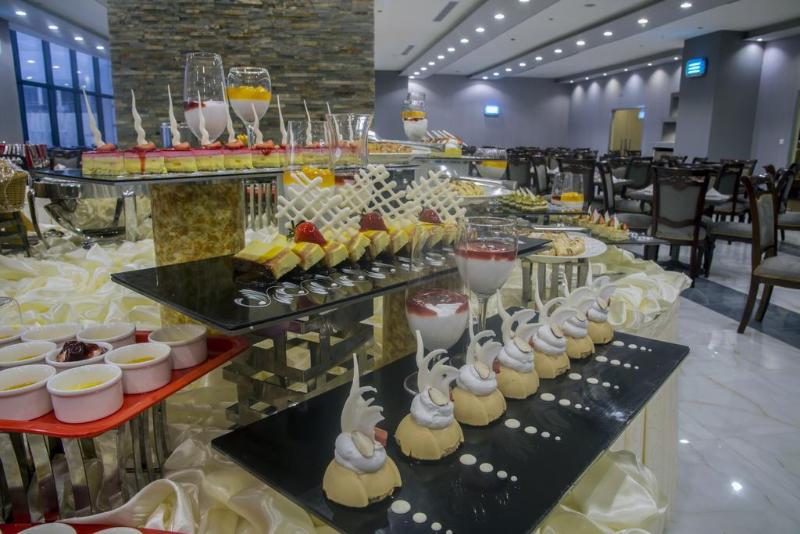 Al Safwah Royale Orchid Hotel - Restoran