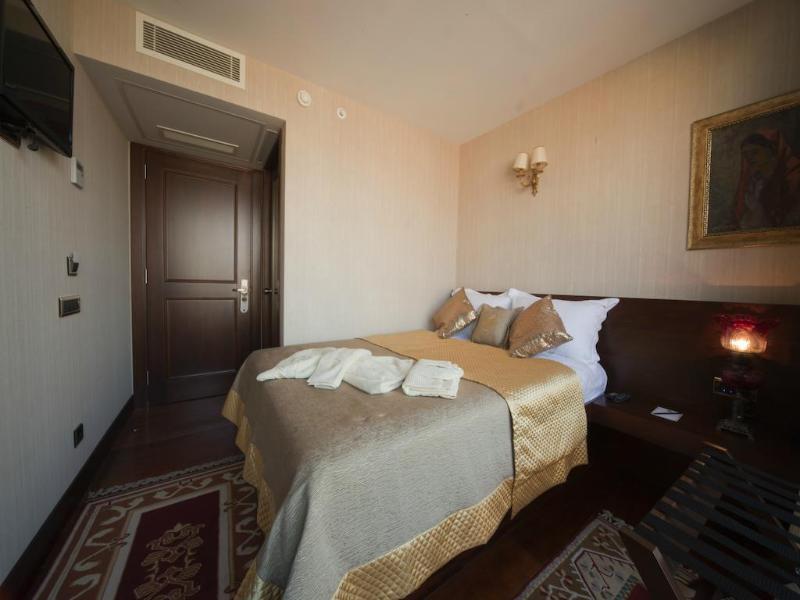 Burckin Suites Hotel - Oda