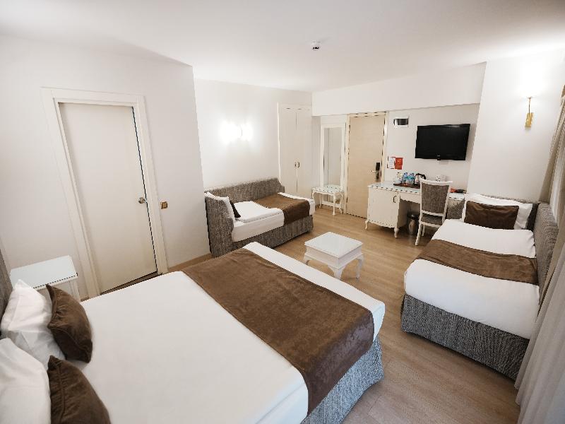Taximtown Hotel - Oda