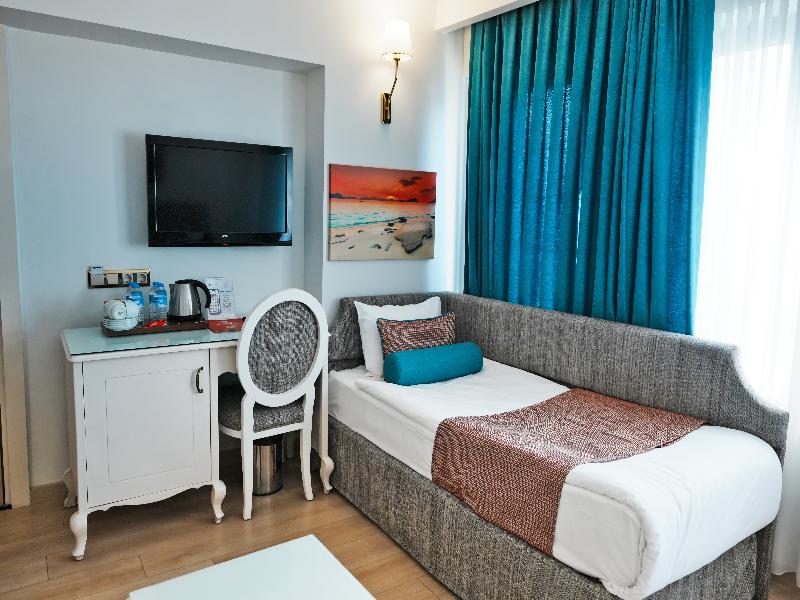 Taximtown Hotel - Oda