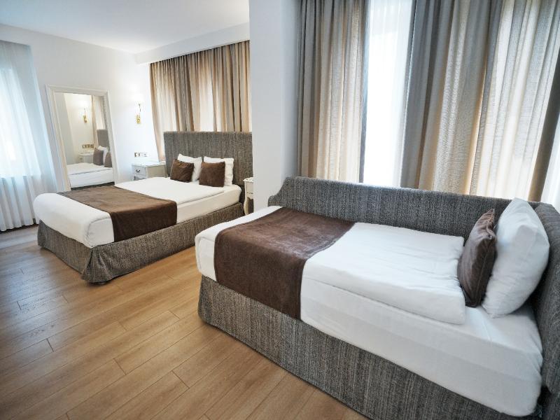 Taximtown Hotel - Oda