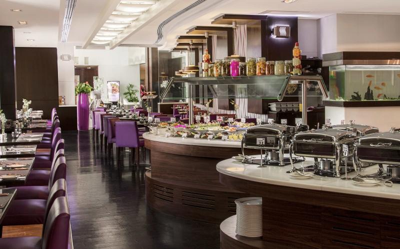 TIME Oak Hotel & Suites - Restoran