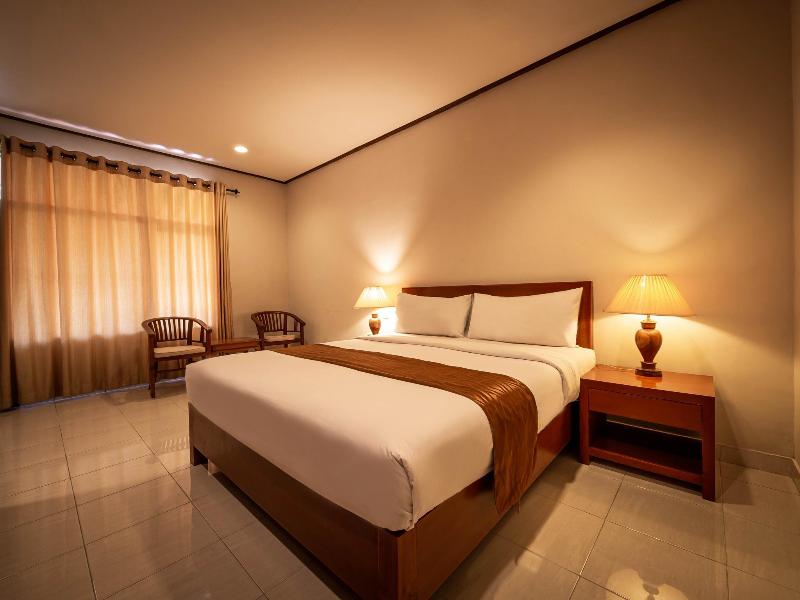 Yulia Beach Inn Kuta - Oda