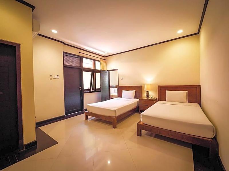 Yulia Beach Inn Kuta - Oda