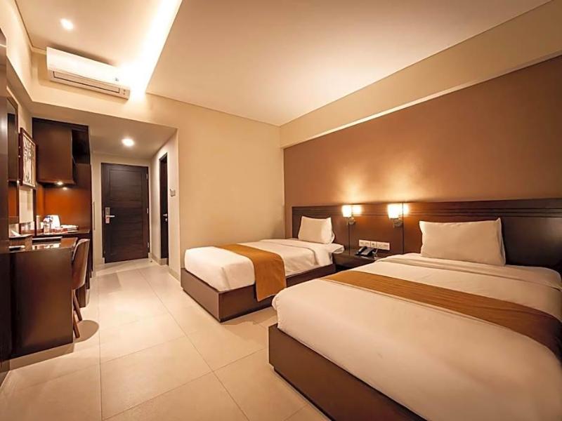 Yulia Beach Inn Kuta - Oda