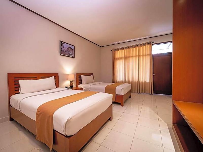 Yulia Beach Inn Kuta - Oda