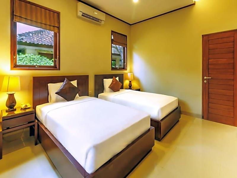 Yulia Beach Inn Kuta - Oda