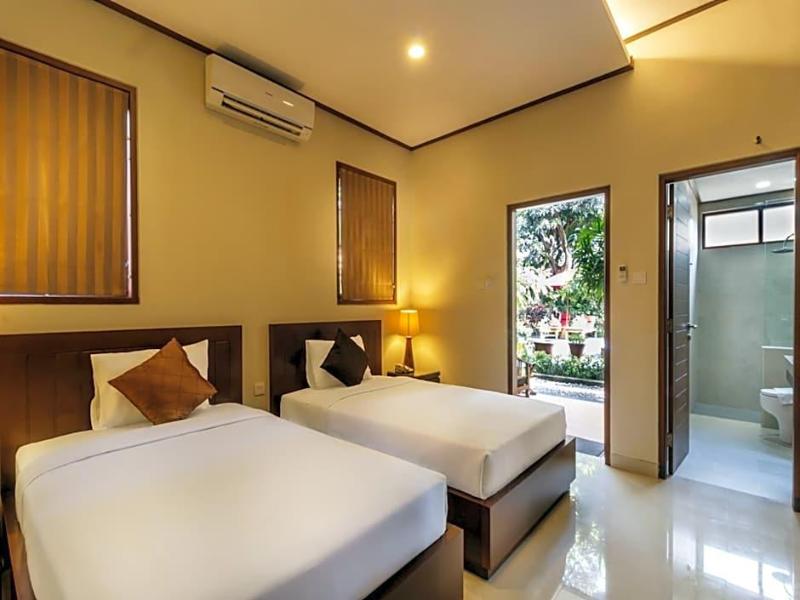 Yulia Beach Inn Kuta - Oda