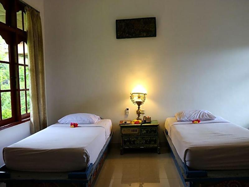 Puri Bunga Cottages - Oda