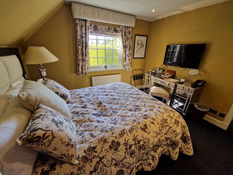 The Cairn Lodge & Hotel - Oda
