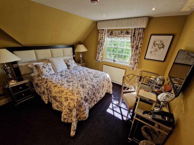 The Cairn Lodge & Hotel - Oda