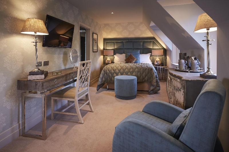 The Cairn Lodge & Hotel - Oda