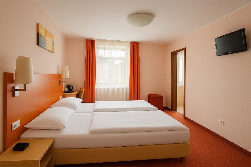 Atomis Hotel Dusseldorf City - Oda