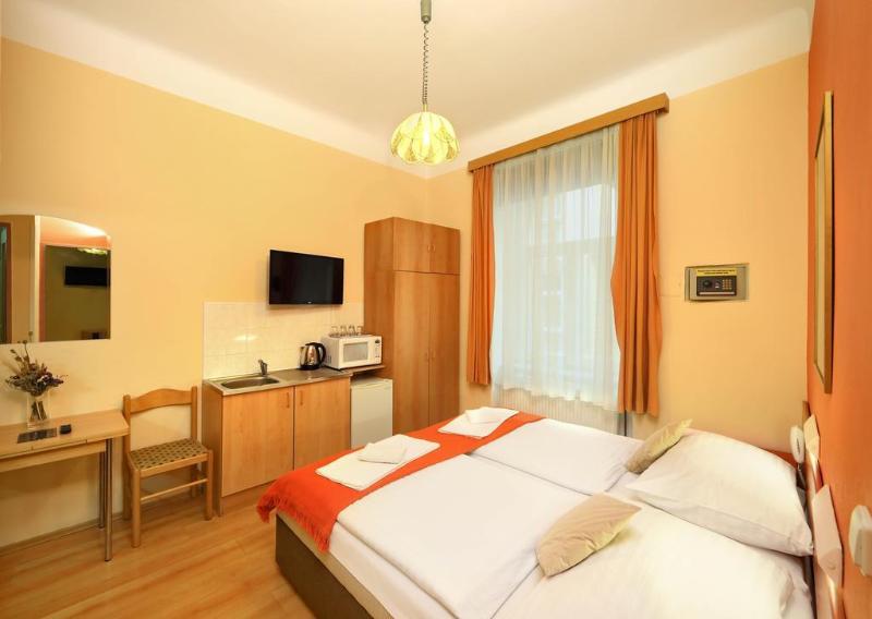 Hotel Golden City Garni - Oda