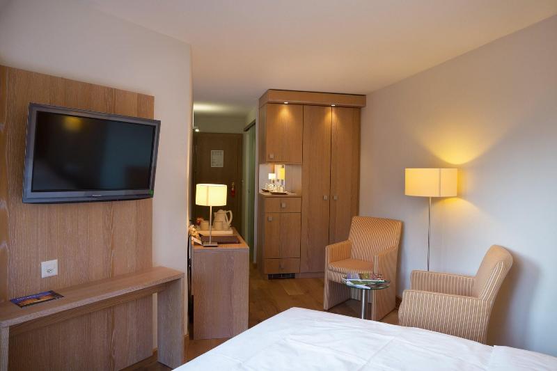 Helvetia Intergolf - Hotel & Apparthotel - Oda