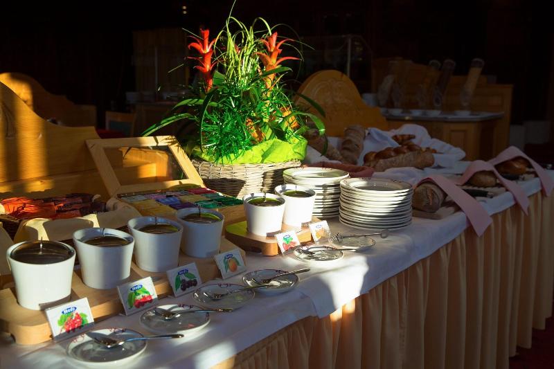 Helvetia Intergolf - Hotel & Apparthotel - Restoran