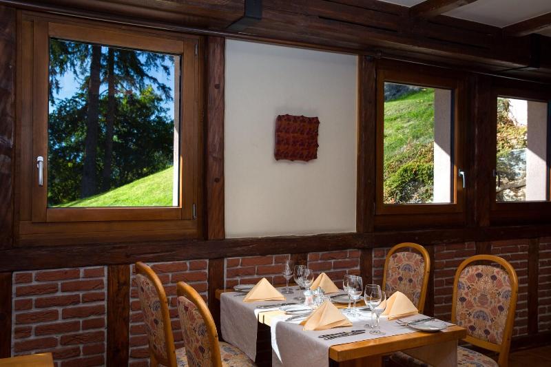 Helvetia Intergolf - Hotel & Apparthotel - Restoran