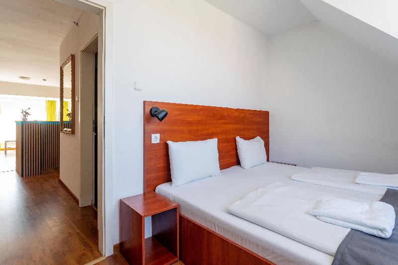 Triple M Hotel - Oda