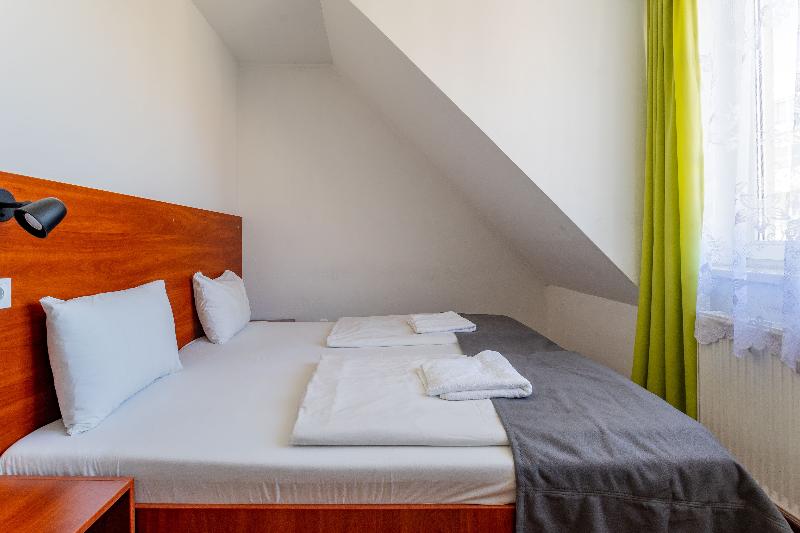 Triple M Hotel - Oda