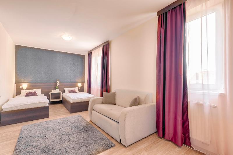Triple M Hotel - Oda