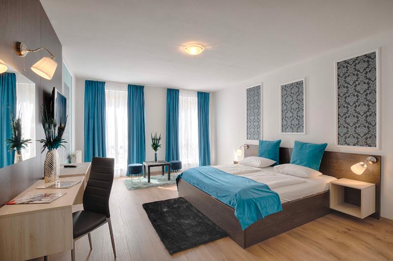 Triple M Hotel - Oda