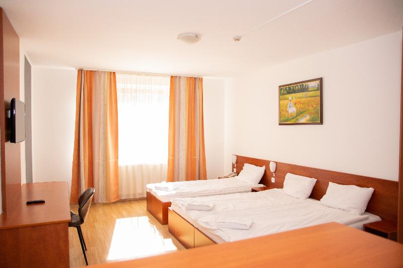 Triple M Hotel - Oda