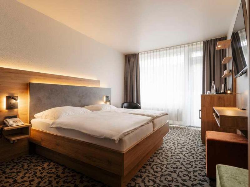 Caravelle Hotel Im Park - Oda