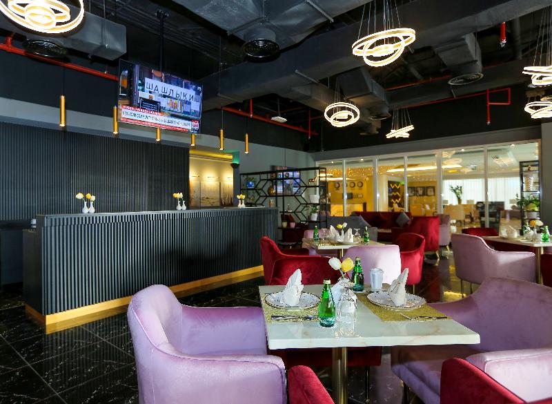 Ivory Grand Hotel Apartments - Restoran