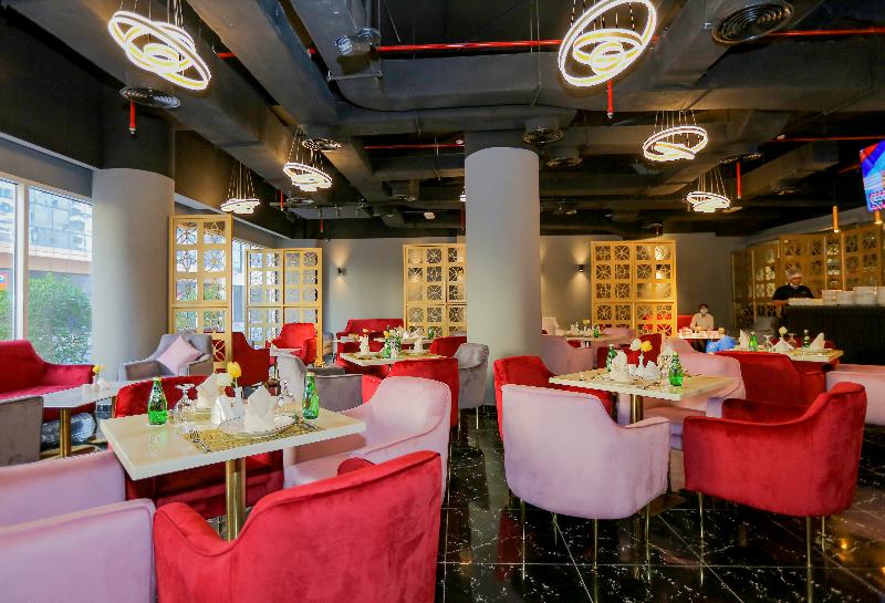 Ivory Grand Hotel Apartments - Restoran